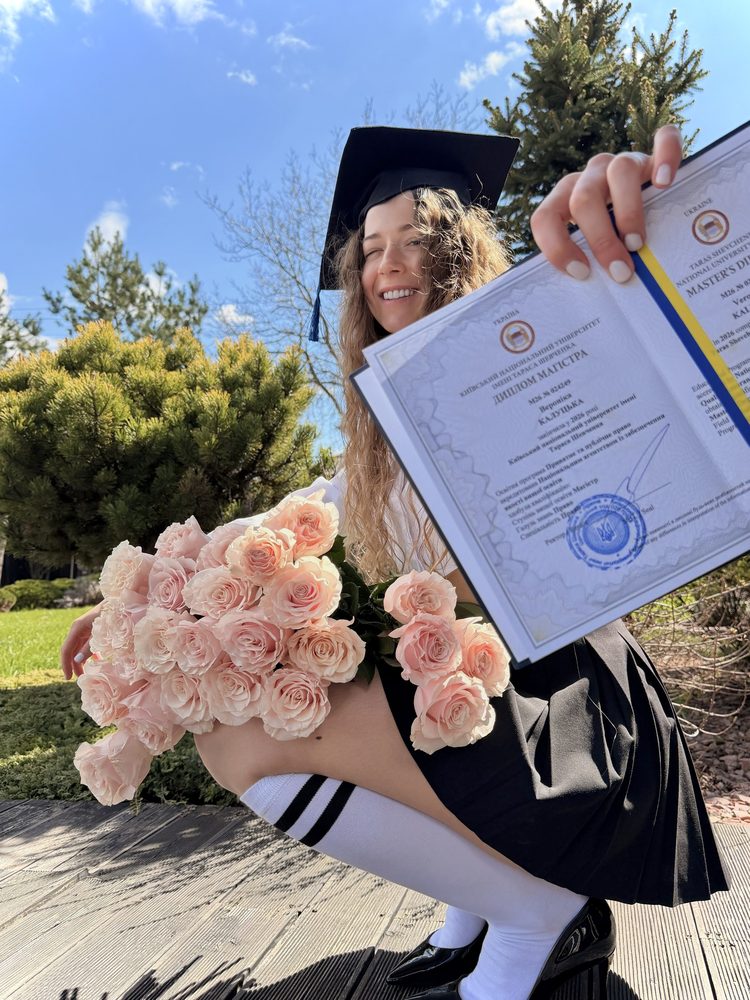 Graduation day with the Master of Law diploma
