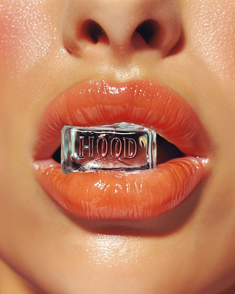 Lips holding an ice cube engraved HOOD